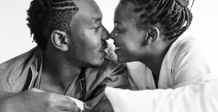 couple being intimate bed