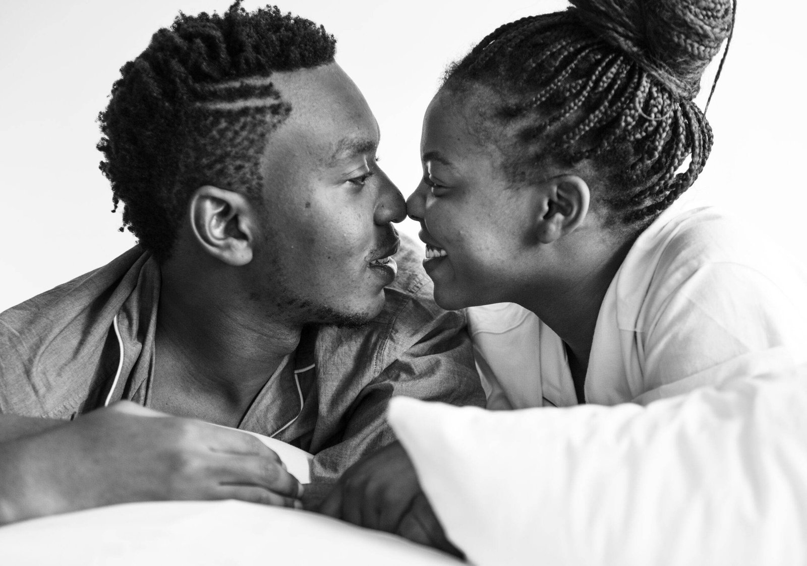 couple being intimate bed scaled