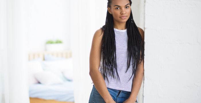 serious african american girl looking camera