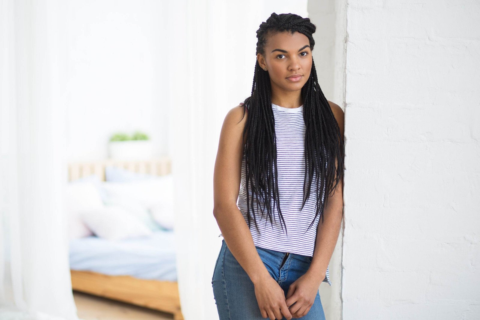 serious african american girl looking camera scaled