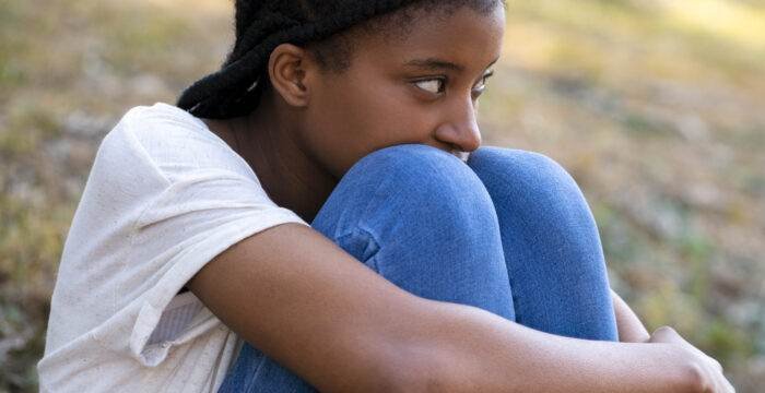 woman feeling sad being judged criticized by people